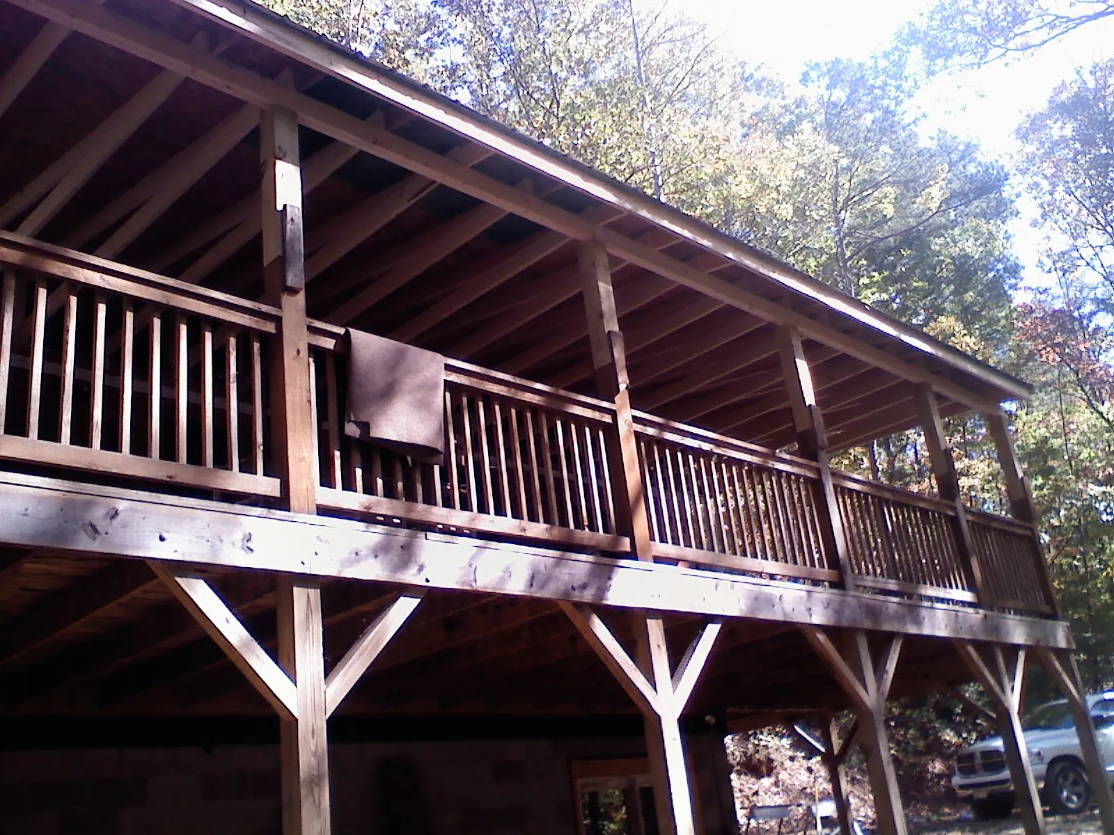 Timber framing under a new elevated porch and deck — Roof Leak Repair in Mendota by Roofing Brothers